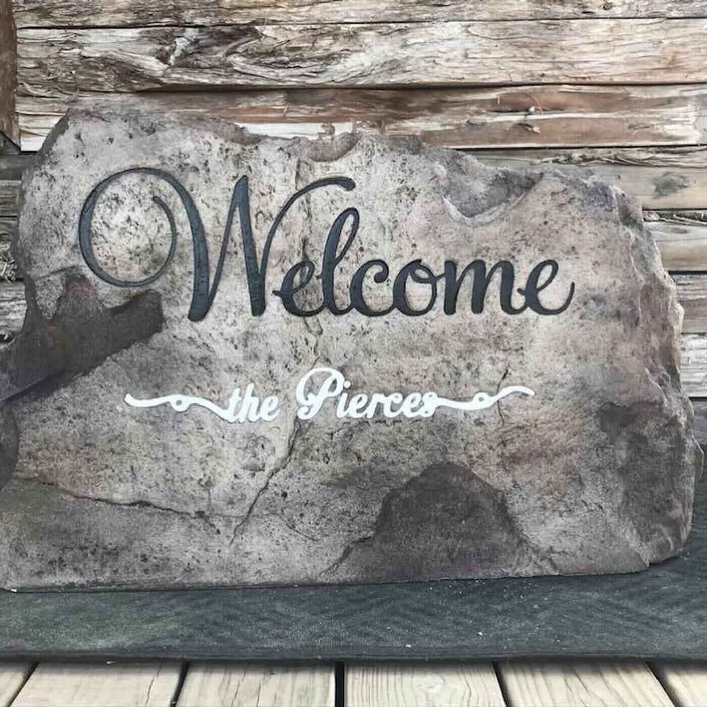 Custom welcome stone engraved into a natural slab with script lettering